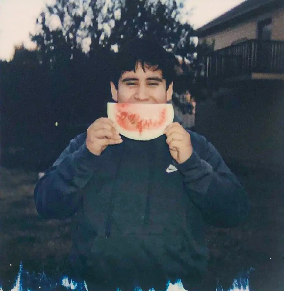 Juan Pablo Holding a Watermelon Slice